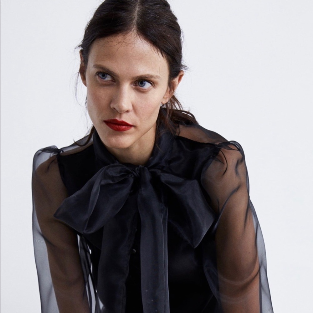 Zara black sheer shirt with black bow detail.
